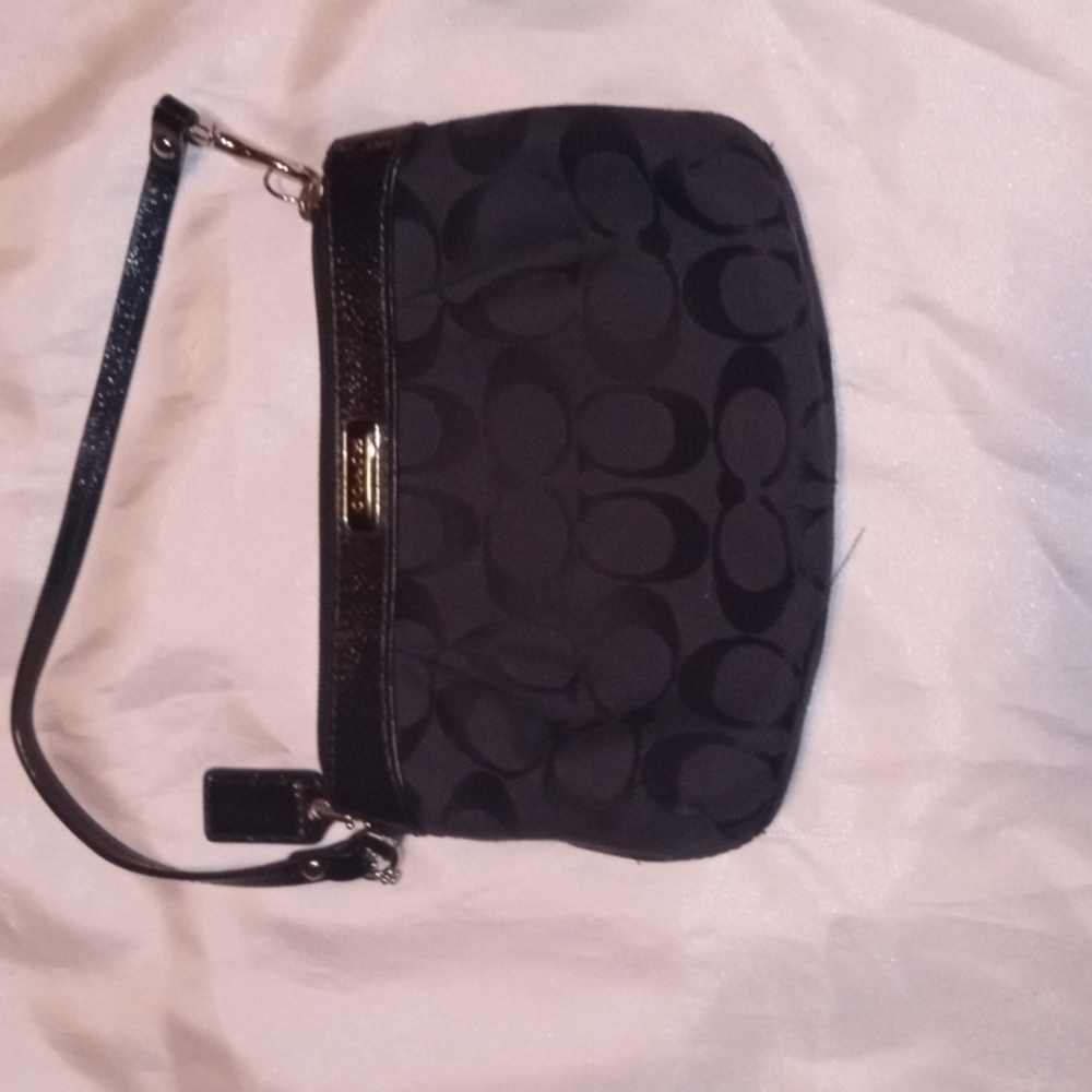 SOLD      Coach signature pouch vintage black